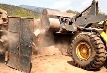 CDA administration started in a large scale operation against an illegal Afghan basti in Sector C-12, demolished several illegal structures