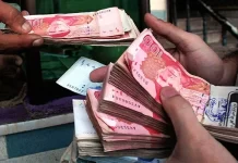 Rupee tumbles to new record low of 276.58 against dollar