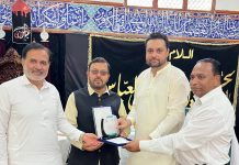 Islamabad (TNS) Asghar Ali Mubarak, Fida Abbas Zaidi presenting shields to Ajmal Zaidi and others of Al-Qaim Lawyers Forum on the occasion of the 12th annual foundation day of Imamia Disaster Management Cell.